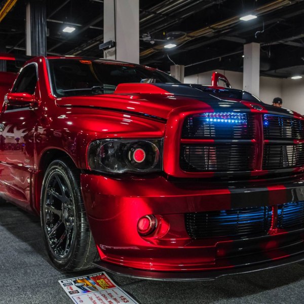 Custom Dark Smoke Headlights on Red Dodge Ram - Photo by Viper Truck Procharged