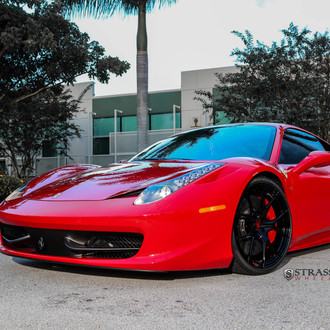 Modern Gloss Black Strasse Rims Adorning Red Ferrari 458