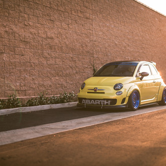 Custom Halo Headlights on Yellow Fiat 500 - Photo by Avant Garde Wheels