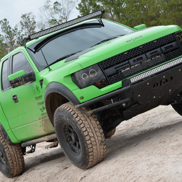 Green Raptor With N-Fab Off-road Bumpers and Side Steps - Photo by Black Rhino