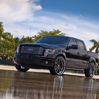 Slightly Modifed Black Ford F-150 on Forged Vossen Rims