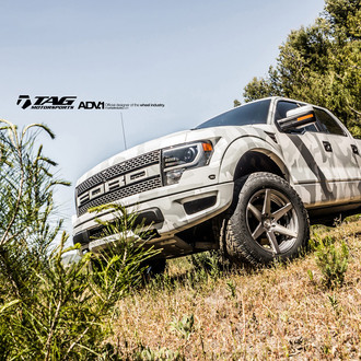 Custom Lifted Gray Camo Ford F-150 Raptor - Photo by ADV.1