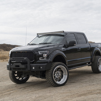 Off-Road Front Bumper on Black Lifted Ford F-150 - Photo by Forgiato