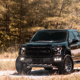 Black Lifted Ford F-150 with Custom Mesh Grille - Photo by Vossen