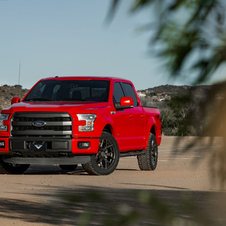 Red Ford F-150 with Aftermarket Projector Headlights - Photo by Venom Rex