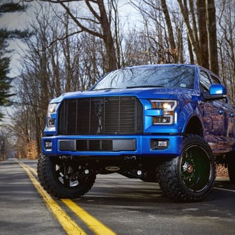 Blue Lifted Ford F-150 with LED Bar Headlights - Photo by CARiD