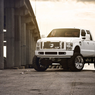 Lifted Ford F250 Custom - Photo by Fuel Off-Road