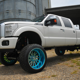 F250 Lariat On Blue Custom Painted Wheels - Photo by American Force