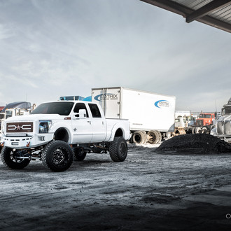 Diamond White F250 Truck on 40 Inch Tires and a Lift - Photo by Dale Martin