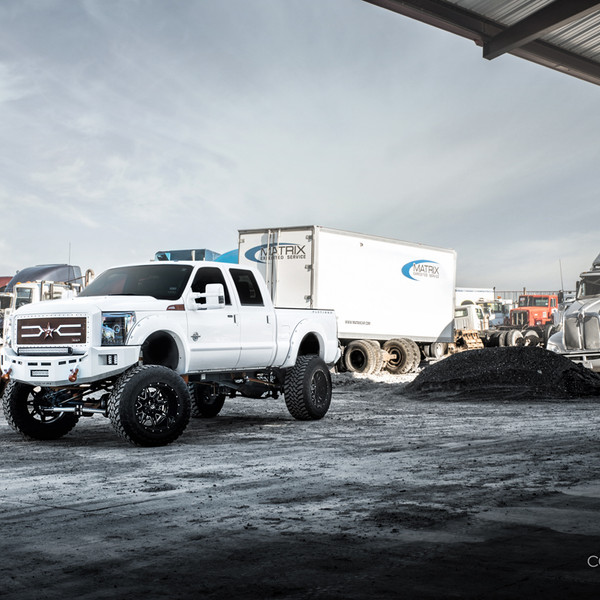Diamond White F250 Truck on 40 Inch Tires and a Lift - Photo by Dale Martin