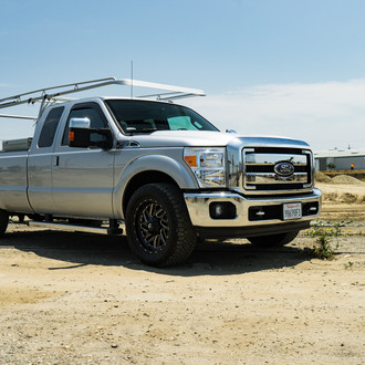 Silver Ford F-250 with Full Cab Chase Rack - Photo by Fuel Offroad