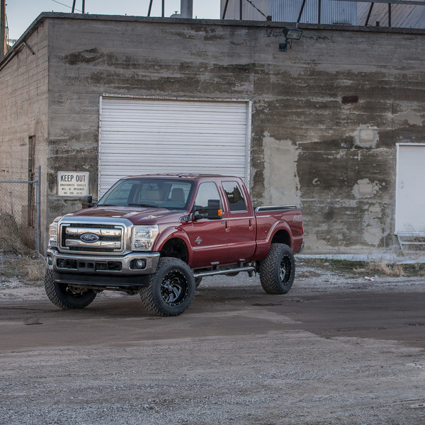 Custom Red Lifted Ford F-250 FX4 - Photo by Fuel Offroad