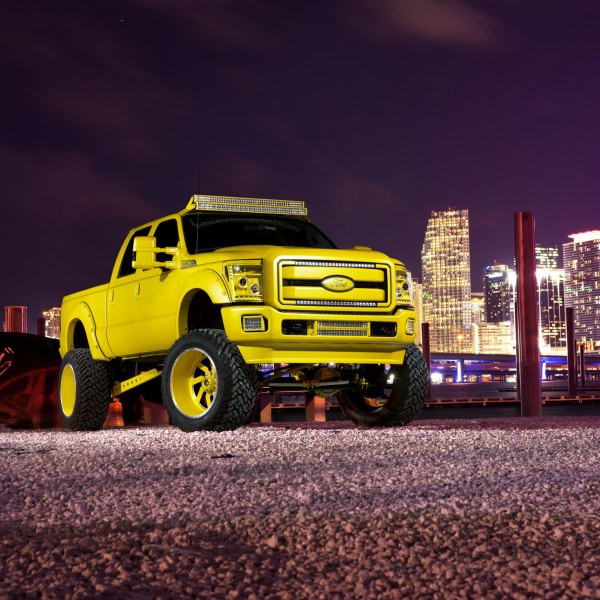 Fully Customized Yellow Lifted Ford F-250 - Photo by Fuel Offroad
