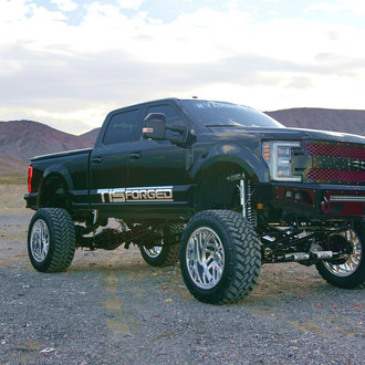 Black Lifted Ford F-250 with Custom Grille - Photo by TIS Wheels