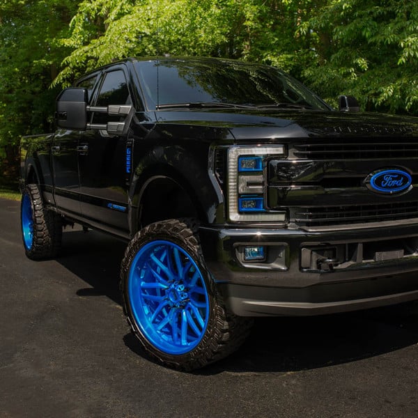 Aftermarket Front Bumper on Black Lifted Ford F-250 - Photo by Grid Off-Road