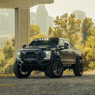 Fab Fours Grumper Front Bumper on Black Ford F-250 - Photo by Forgiato