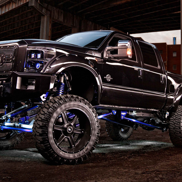 Rugged F250 Lifted Truck with LED Underbody Lights - Photo by LRG Rims
