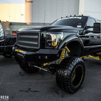 Black F250 With Custom Painted Steel Bumper - Photo by Jason Scott