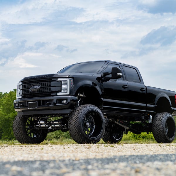 Custom Black Lifted Ford F-350 Super Duty - Photo by Fuel Offroad