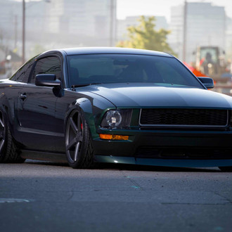 Stanced Out Ford Mustang on Dark Smoke Vossen Rims