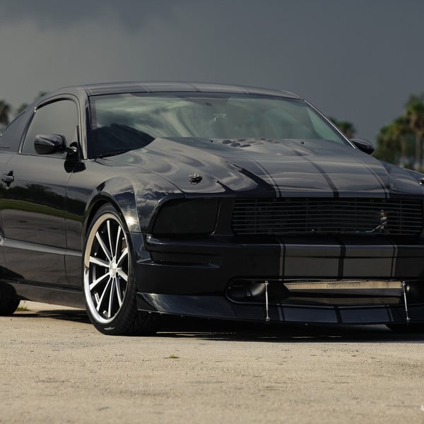 Blacked Out Ford Mustang with Custom Front Lip - Photo by Vossen