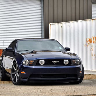 Aftermarket Front Bumper on Blue Ford Mustang 5.0 - Photo by Vossen