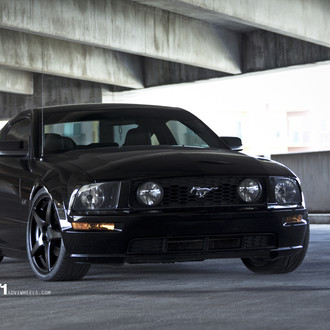 Black Ford Mustang GT with Custom Front Bumper - Photo by ADV.1