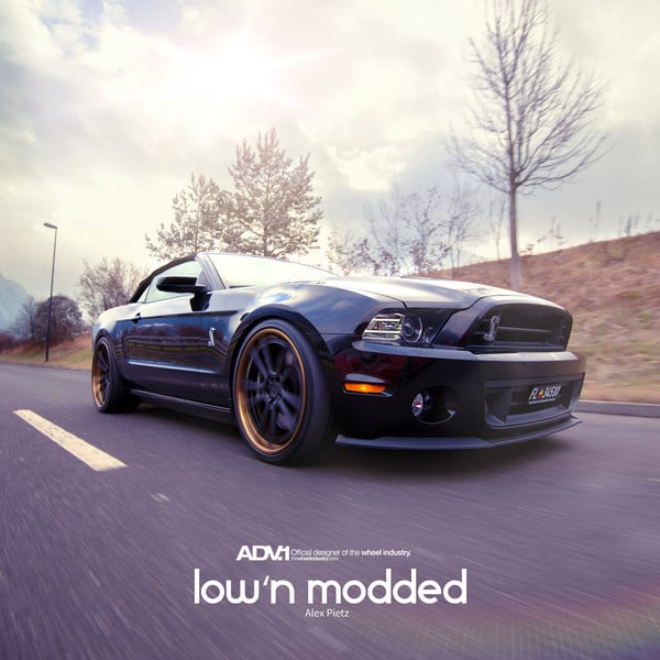 Aftermarket Front Lip on Black Ford Mustang - Photo by ADV.1