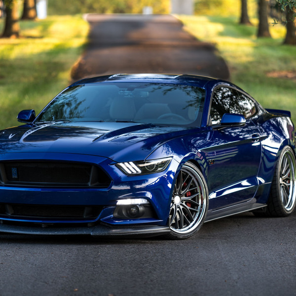 Blue Ford Mustang 5.0 with Custom Front Lip - Photo by Velgen
