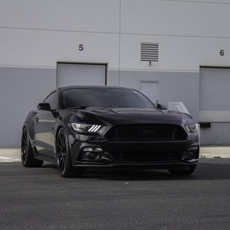 Front Bumper with Fog Lights on Black Ford Mustang - Photo by Zito Wheels