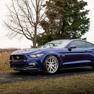 Blue Ford Mustang with Custom Projector Headlights - Photo by Rohana