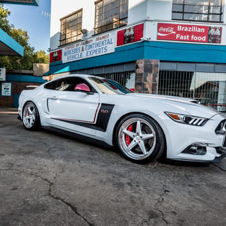 White Ford Mustang 5.0 on Continental Tires - Photo by Vossen
