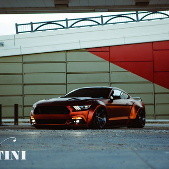 Liberty Walk Body Kit on Orange Ford Mustang GT - Photo by Vertini Wheels