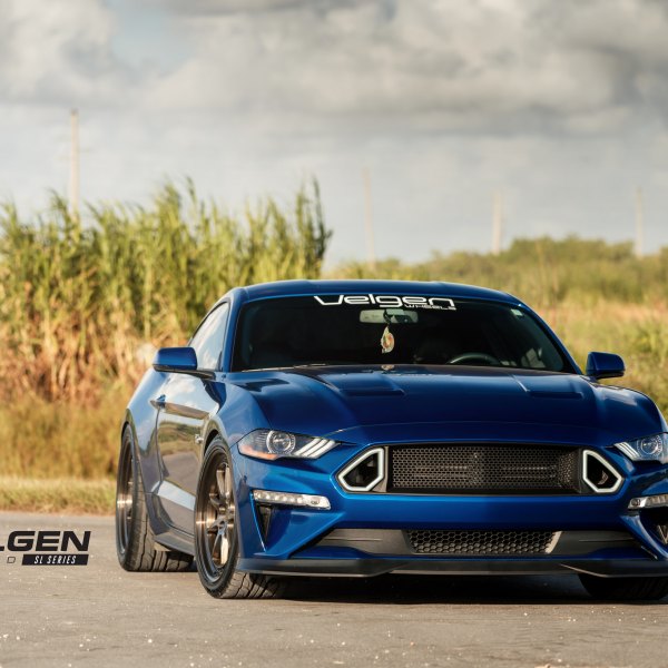 Aftermarket Front Bumper on Blue Ford Mustang - Photo by Velgen Wheels