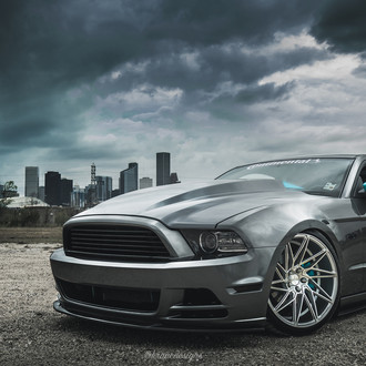 Slammed V6 Mustang With a Cowl Hood and Air Suspension - Photo by ACE Alloy