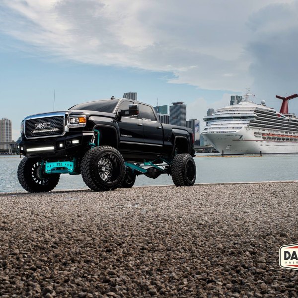 Megaliner Lifted GMC Sierra With Suspension Lift and 40 Tires - Photo by Dale Martin