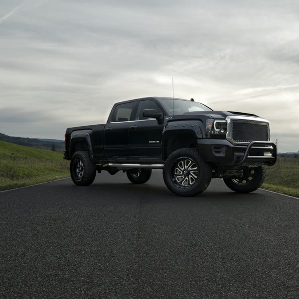 Sierra 2500HD on Fuel Flow 8 Off-Road Rims - Photo by Fuel Off-Road
