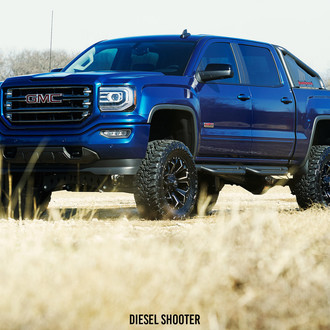 Blue GMC Sierra 1500 with Painted Bed Mount Sport Bar - Photo by Diesel Shooter