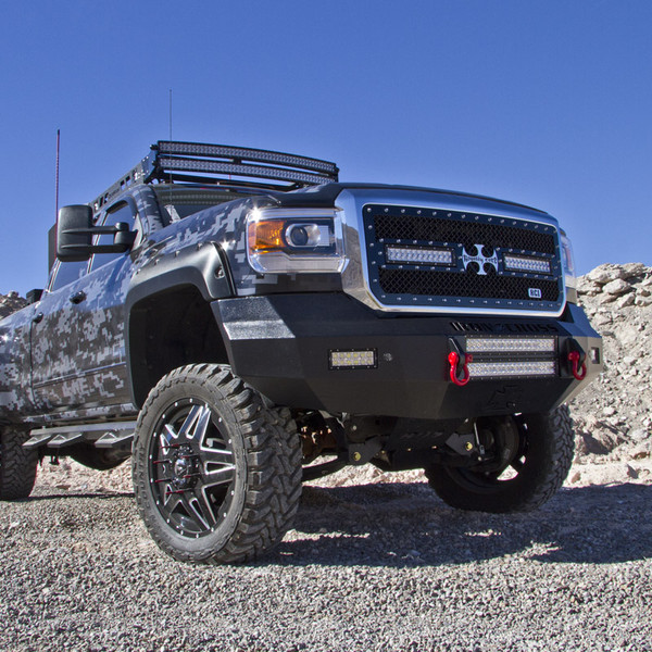 Lifted 2500HD Dually with Digital Camo Wrap and Mud Tires - Photo by BDS suspension