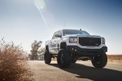 Heavy Bomb: White GMC Sierra Fitted with X-Metal T-Rex Mesh Grille