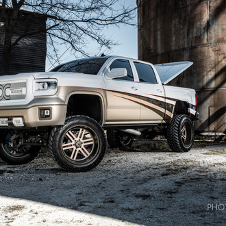 Custom Painted GMC Sierra With Colormatched Hard Shell Bed Cover - Photo by Dale Martin