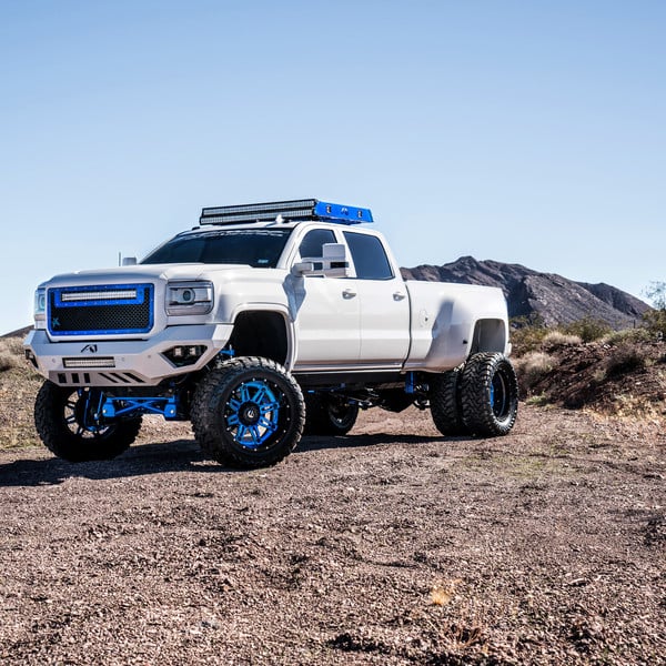 Custom Lifted Sierra HD Duramax On Blue Fuel Wheels - Photo by Fuel Off-Road