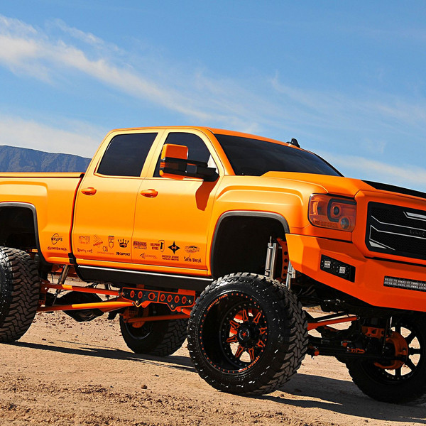 Suncoast Matte Orange Lifted GMC Sierra Denali - Photo by Phil Gordon