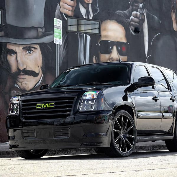 Menacing All-Black GMC Yukon on Lexani CSS 15 Wheels - Photo by Lexani