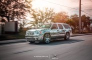 Tattooed GMC Yukon With a Chrome Wrap and Concavo Rims