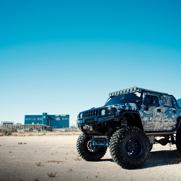 Lifted Camo Hummer H2 with Off-Road Winch Front Bumper - Photo by Grid Off-Road