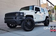 Royal White Hummer H3 Wearing Gloss Black Onyx Wheels