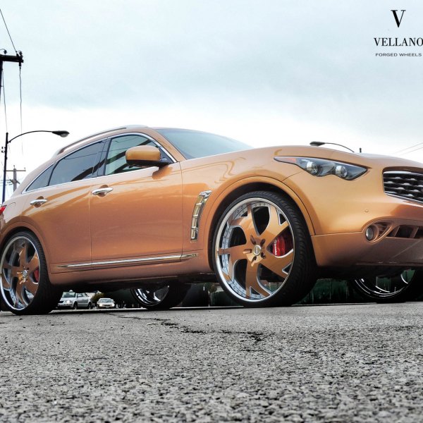 Custom Chrome Grille on Orange Jaguar FX50 - Photo by Vellano