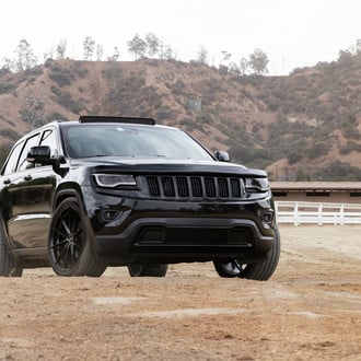 Dark Smoke Headlights on Black Jeep Grand Cherokee - Photo by Vorsteiner