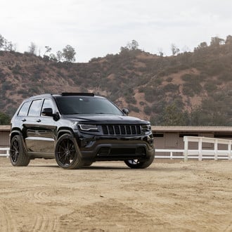 Black Jeep Grand Cherokee with Custom Front Bumper - Photo by Vorsteiner